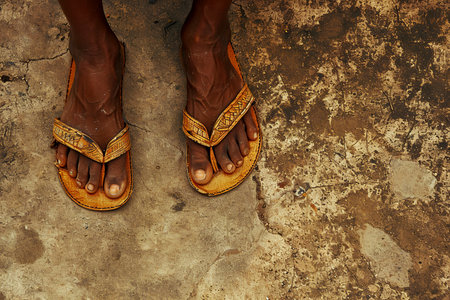 close-up of a woman feet with sandals.の素材