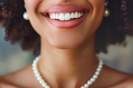 A healthy snow-white smile with a pearl necklace and a earringの素材