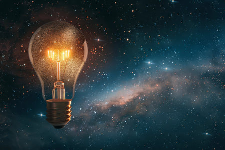 A light bulb floating in space among the starsの素材