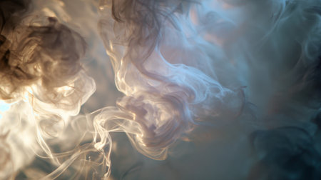 Colorful smoke billows and twists gracefully filling the empty space with dynamic shapes and textures.の素材