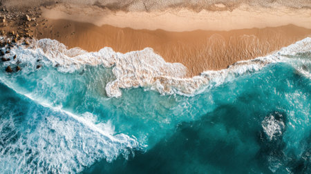 Gentle waves roll onto a sandy beach during sunset, casting a serene atmosphere. The turquoise water meets the golden sand, inviting relaxation and tranquility.の素材