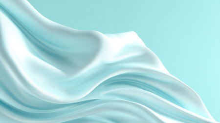 Delicate blue fabric drapes elegantly creating smooth waves against a calm aqua background.の素材