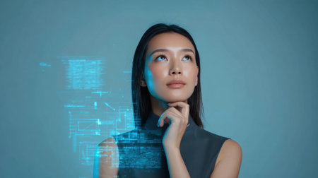 A young woman with long black hair is pondering thoughtfully while looking up. Surrounding her are glowing digital elements, creating a futuristic atmosphere.の素材