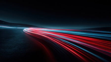 A long red, blue and white line of lights. The lights are moving and are very brightの素材