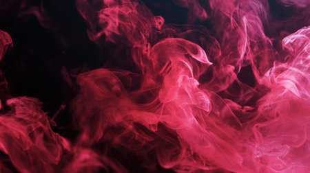 Red smoke swirls and dances in a dark space creating a captivating visual effect filled with mystery.の素材