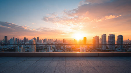 The scene captures a vibrant sunset illuminating a city skyline. Tall buildings are silhouetted against orange, pink, and purple hues during the evening.の素材