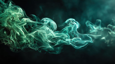 Green smoke elegantly flows and swirls in various shapes against a dark backdrop, evoking a sense of mystery and intrigue in the atmosphere.の素材