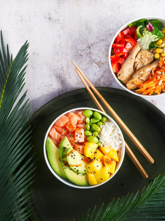 Hawaiian trendy poke bowls, salmon, heura soy protein or vegan chicken, variety vegetables, served...
