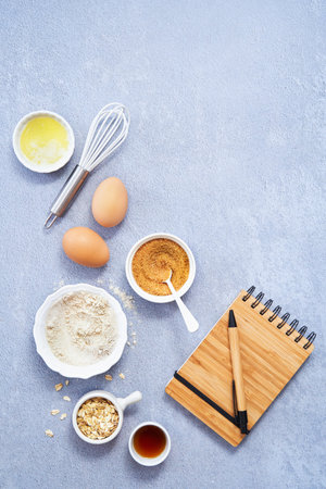 Ingredients for homemade oat pancake, whole grain oat, coconut sugar, vanilla syrup, organic eggs a...