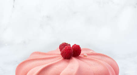 Banner Poster pink cake with raspberry. Make background with free space for text. White background. Copy space, selective focus. Bakery shop concept for web design slider.の写真素材
