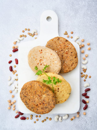 Variety meat free plant based burgers, veggie legumes patties, quinoa, chickpeas, lentils, beans, on...