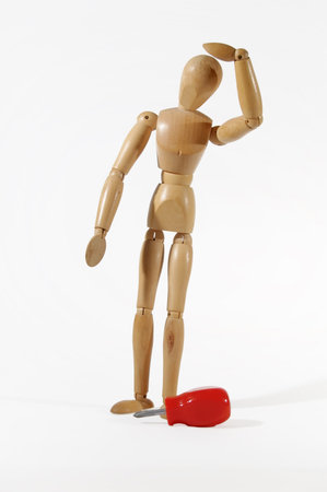 manikin with screwdriver on white background - electrician の写真素材