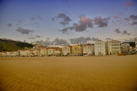 Portuguese destination Nazar houses and beach at twilightのeditorial素材