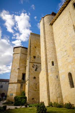 Larressingle, one of the most beautiful and small fortified villages in France with walls, towers, moats, entrance bridge, castle, fortified church and medieval houses attached to the wallsのeditorial素材