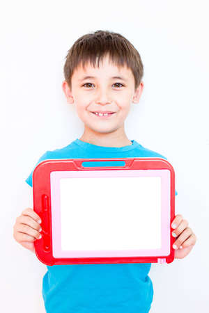 smiling boy with a banner in his handsの写真素材