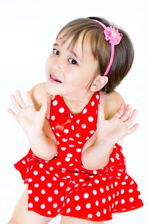  a little girl in red dressの写真素材