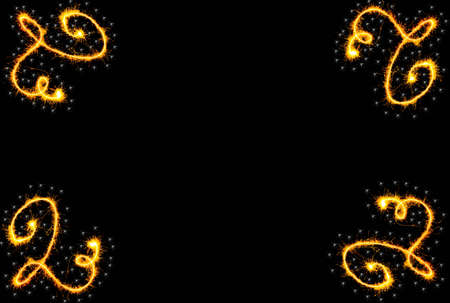 curls of Bengal lights on a black backgroundの写真素材