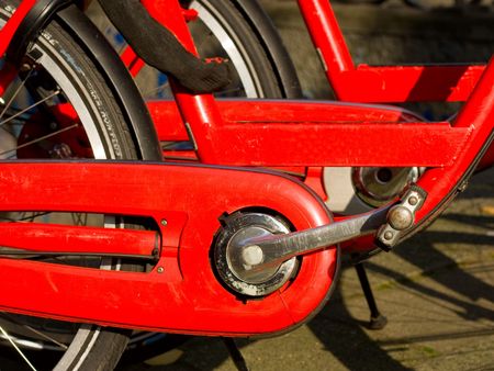 of the red bike with the pedals in a rowの写真素材