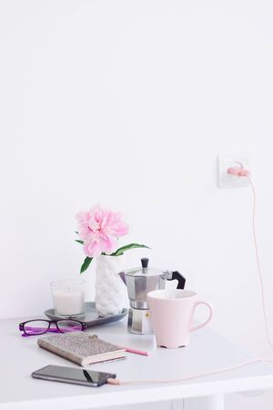 teeneger girl back college. coffee, planer, phone. workplaceの写真素材