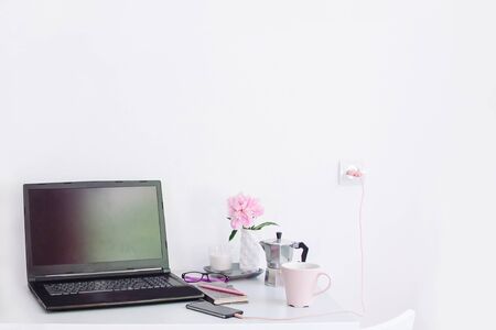 Dorm room, table with stationery and laptop. back to school, ready for studying.の写真素材