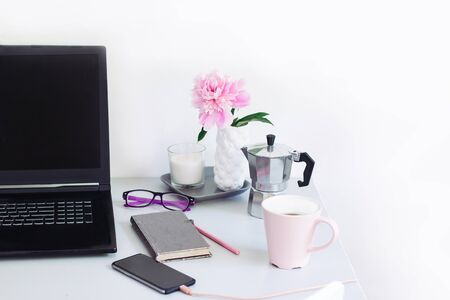 Dorm room, table with stationery and laptop. back to school, ready for studying.の写真素材
