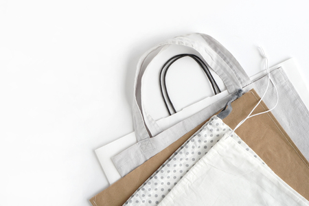 Shopping bags on white background.Cotton and paper bags for free plastic shopping.の写真素材