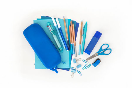 Stationery stack . Back to school. Paper sheets notepad pencils multicolor pen sharpener pencil case...