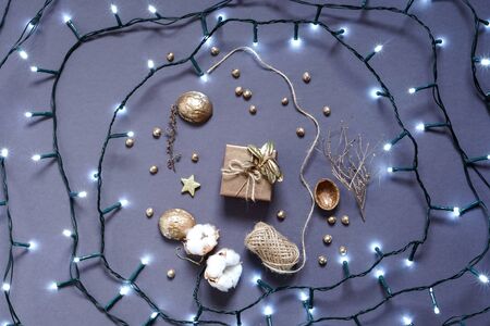 Gift box, decoration natural materials and led garland. Photoの写真素材
