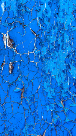 Crackled paint on metal surface. Abstract background