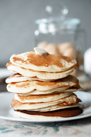 Hot homemade stack of pancakes with butterの写真素材