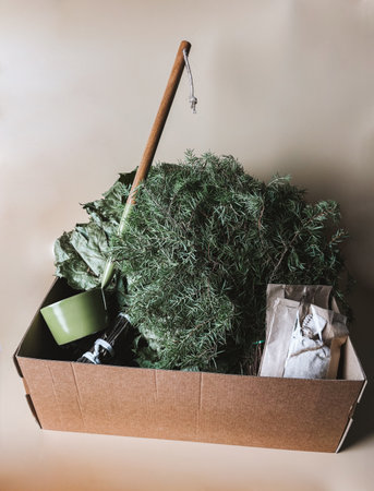 Gift box with Sauna accessories: Juniper broom, dry broom for steaming, a ladle, mug, a bags of herbsの写真素材