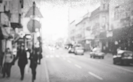 Abstract urban background with blurred buildings and street, shallow depth of focusの写真素材