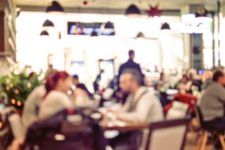 Blurred background : Vintage filter, People in Coffee shop blur background with bokehの写真素材