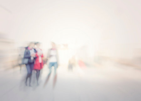 people shopping in the city in motion blur