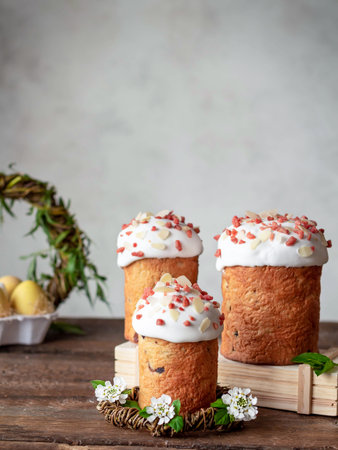 Easter composition with Easter cake, Kulich and colored eggs