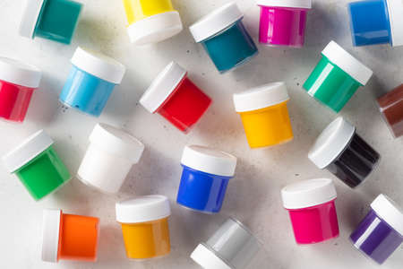 Multicolored gouache cans backgroundの写真素材