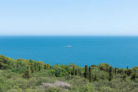 Beautiful landscape with calm blue sea, blue sky, cruise shipの写真素材