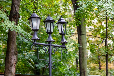 Old lights are in the Park, one broken glass.の写真素材