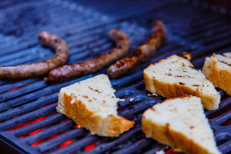Sausages and bread fried on the grill that evening.