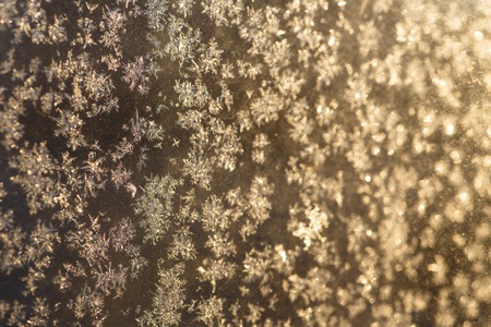 Little frosty patterns on glass, visible snowflakes. Winter in Russia.の写真素材