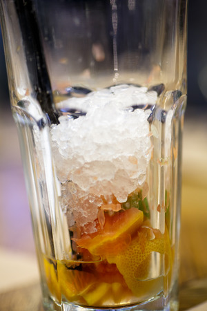 The lemonade drank, and the glass was ice and fruit. The end of the eveningの写真素材