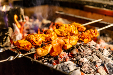 Pieces of chicken ( wings and thighs) fried on the grill.の写真素材