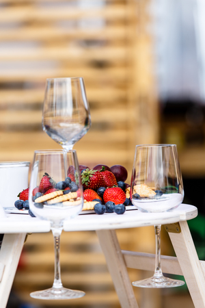 Wine glasses and fresh berries. Why this design is not know.の写真素材