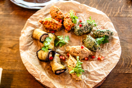 Traditional Georgian cuisine snacks - rolls of eggplant and "Phala" - a vegetable pate.の写真素材