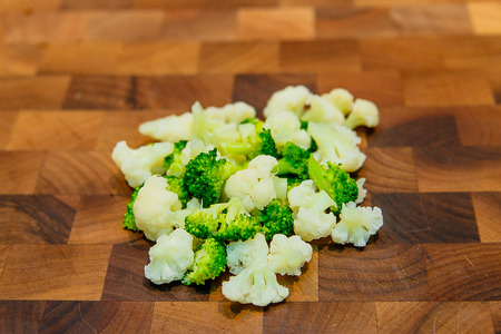 Broken into pieces broccoli and cauliflowerの写真素材
