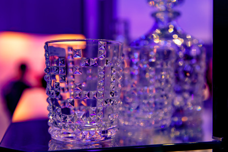 A nice glass of water with rhinestones are at the barの写真素材