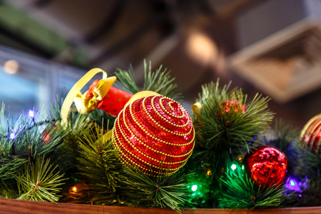 Christmas and New year. Red balls on the Christmas tree .の写真素材