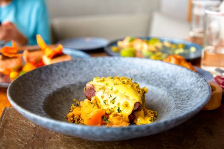 Beef stew with pumpkin and cheese crust.の写真素材