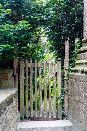 Old wooden gate to the gardenの写真素材