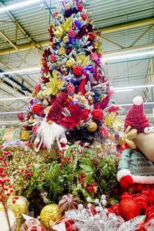 Christmas market in the supermarket: Christmas trees , decorations, toysの写真素材